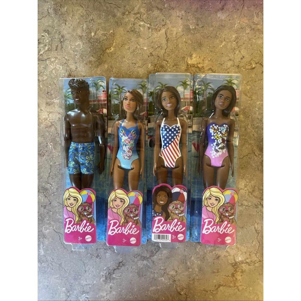 LOT OF 4 Barbie/Ken Dolls With Bathing Suits